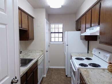 Sparkling clean and handy kitchen area.