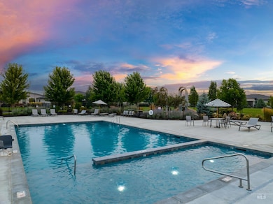 Community pool featuring a patio