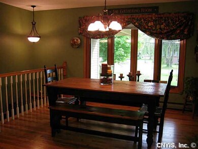 Dining Room. Updated lighting, gleaming hardwoods 