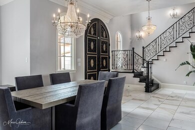 Dining space open to the formal living room and ad