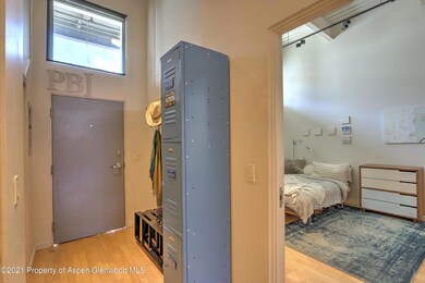 entry looking into primary bedroom