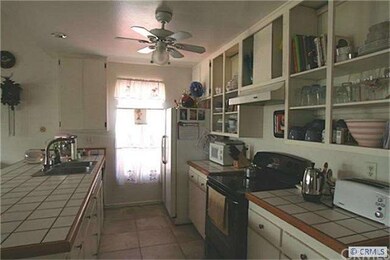 KITCHEN ALSO HAS PANTRY