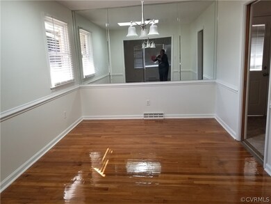 Dining Room with skylight & pocket door at right s