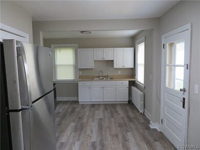 Kitchen featuring a healthy amount of sunlight, wh