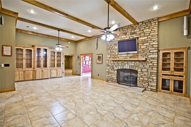 Living Room with Custom Cherry Blend Rock Fireplac