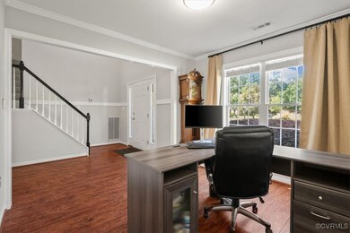 Office area with wood-type flooring and ornamental