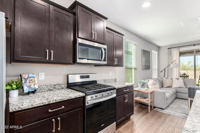 Staggered Espresso Cabinets w/Handles