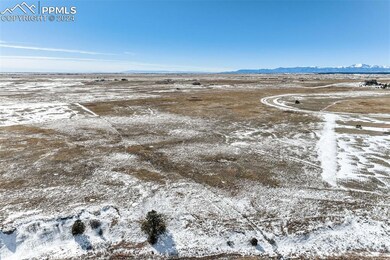 Snowy aerial view with a mountain view