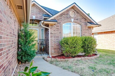 View of exterior entry with a lawn