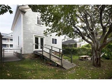 Yard/Garden. Back yard with a beautiful shade tree