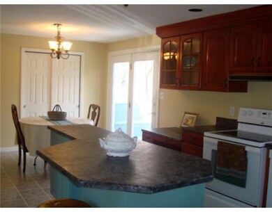 Exterior Front. Kitchen with island
