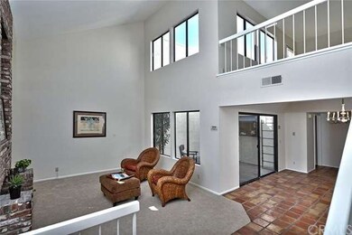Light and bright living room with cathedral ceilin