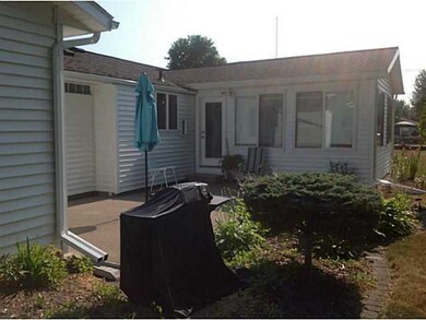 Exterior Back. The backyard features a patio locat