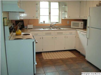 BRIGHT KITCHEN WITH GREAT CABINET STORAGE