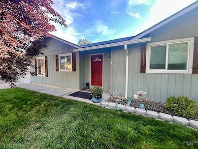 Property entrance with a lawn