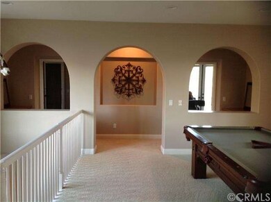 Upstairs loft featuring pool table included in sal