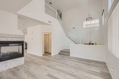Living Room with vaulted ceiling and Cozy Fireplac