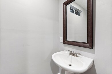 Half Bath located by the kitchen and dining room