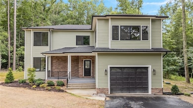 View of front of property featuring a porch, an at