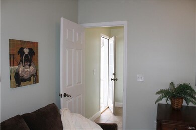 Spacious vestibule leads to the private entrance..