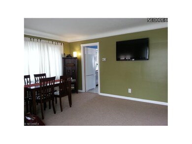 another view of LR/DR and doorway to kitchen.(wall