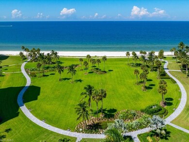 Aerial view with a beach view and a water view