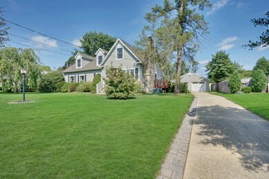 CONCRETE DRIVEWAY TO OVERSIZED GARAGE