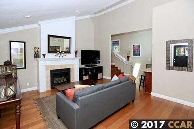 Vaulted ceiling and gas fireplace in living room