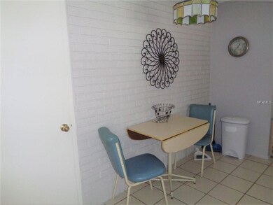 Dinette space and closet pantry finish the kitchen