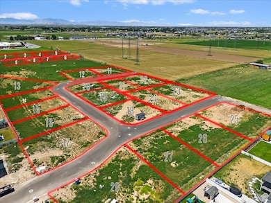Aerial overview of property's location with property boundaries highlighted and mountains