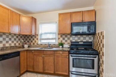 Kitchen with granite counters and stainless steel appliances