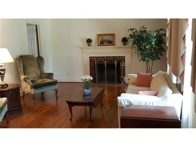 Formal living room with beautiful wood floors and 