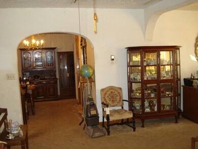 Living room view into dining room