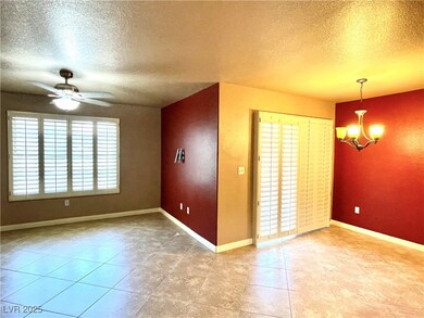 Family room with tiled flooring and open floorplan