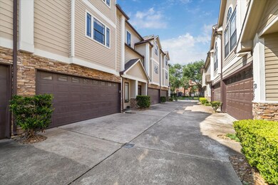 Bright, open-concept living space featuring hardwood floors, oversized windows, and clean contemporary finishes.
