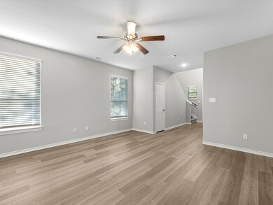 The living space is bathed in abundant natural lig