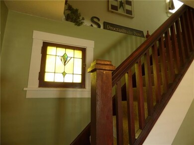 Original woodwork and leaded glass window