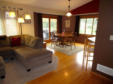 Informal dining open to the living room and kitche