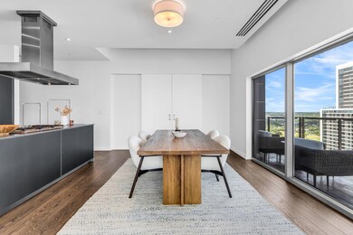 Dining space with baseboards and dark wood-style 