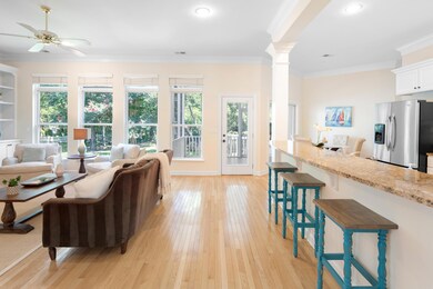 THE KITCHEN IS OPEN TO THE FAMILY ROOM