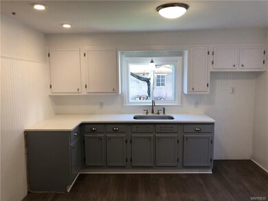 Beautiful quartz countertop with shaker style cabi
