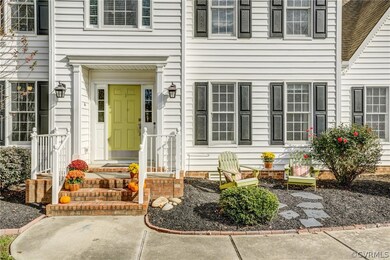 Easy care white vinyl siding, black shutters and b