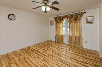 Living room with newer hardwood floors.