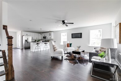 Living room featuring dark hardwood / wood-style f