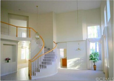 Grand Stairway and Formal Dining Room for Large Ga