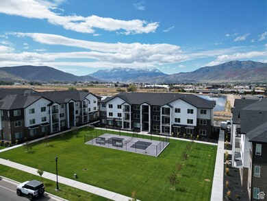 Aerial perspective of suburban area featuring a mountainous background