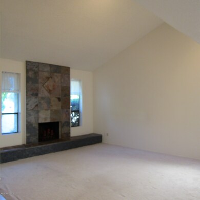 Living room with vaulted ceiling