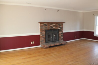 Open, Expansive living room with hardwood floors,c