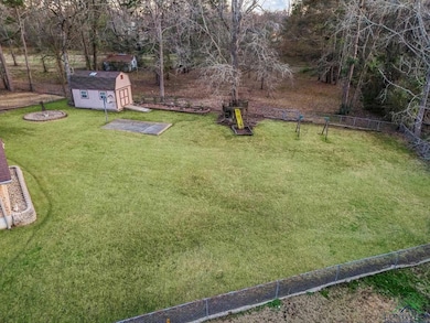 View of yard with a storage shed