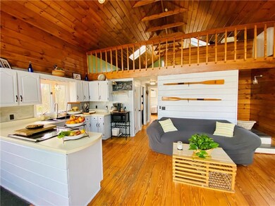 Large, cathedral beamed ceilings. Open living spac